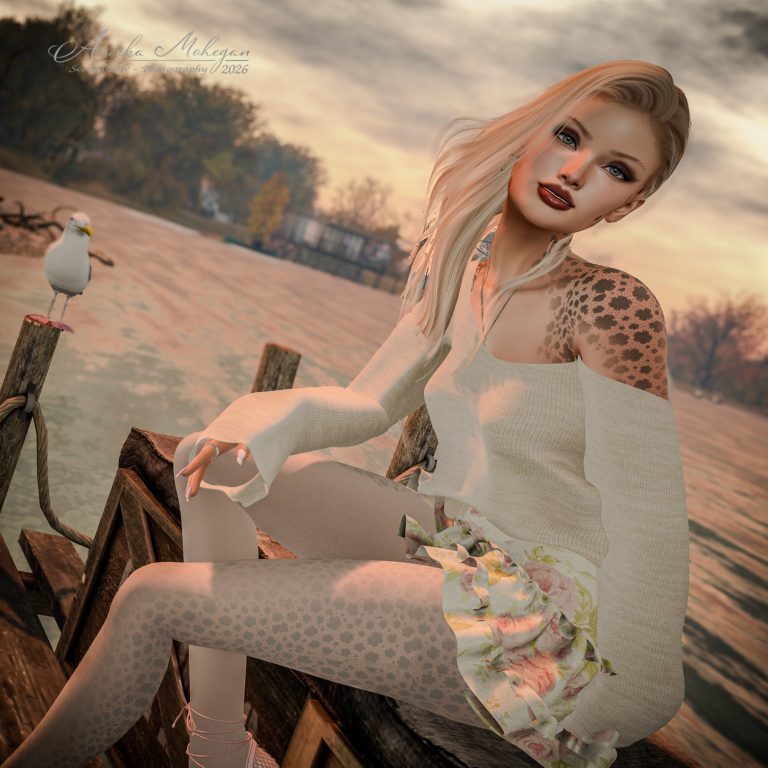 Annika Mohegan im Carley-Look von Asteria: Strickbluse in Ivory mit offenen Schultern und Volantrock mit Rosenmuster, fotografiert im Herbst auf Luanes World in Second Life