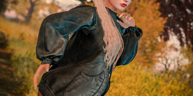 Annika Mohegan in der weiten petrolfarbenen Lederjacke Classic Bomber von (fd) mit zweifarbiger Brille, vor rotem Herbstlaub auf Luanes World in Second Life